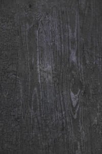 Carbonized Wood charred wood wall panels in Black finish with a dark wood grain texture