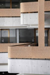 Rockface Granite Golden Sesame granite wall panels on a modern building facade