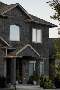 Cultural Stone Grey Black exterior wall panels on a modern villa