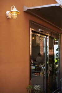 W Weaving 3D wall panels applied to a restaurant exterior wall with a woven-inspired texture