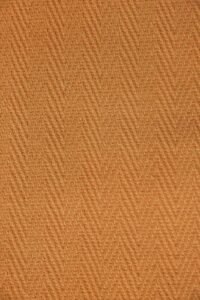W Weaving 3D wall panels in Orange, featuring a distinctive woven texture