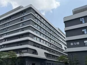 Guangzhou Huadu industrial park after renovation, featuring flexible stone wall cladding and an updated building facade.